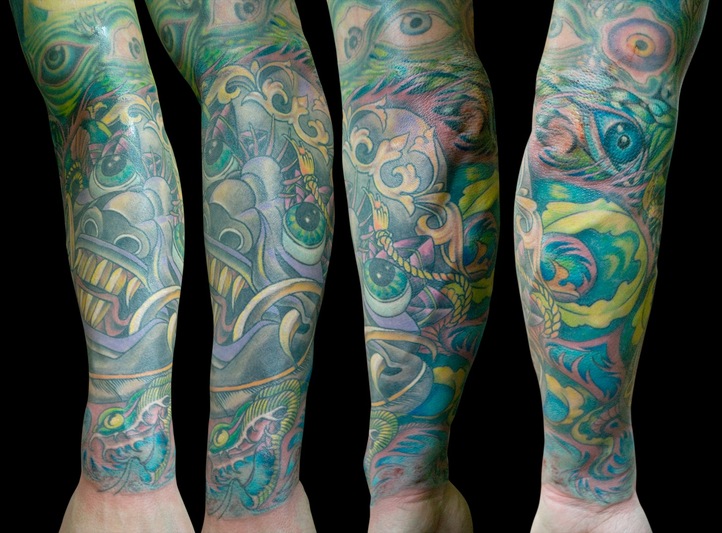 Blue themed forearm design with many eyes